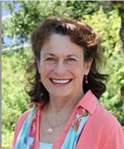 Image of a woman wearing a pink shirt