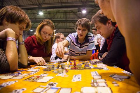 photo of people playing a card game