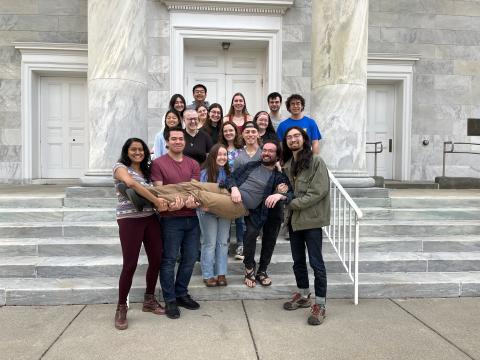 Image of choir members in front of a flight of steps