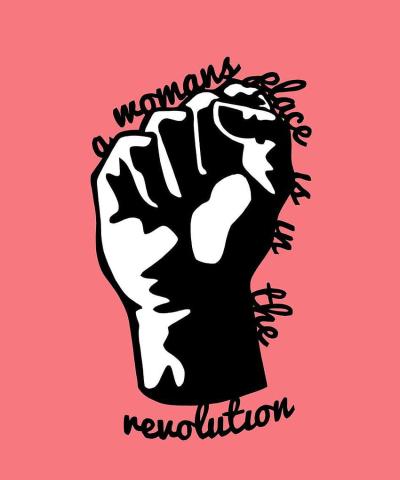 Black and white fist on a pink background with the words "A woman's place is in the revolution"