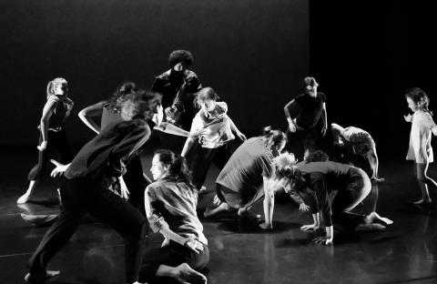 black and white image of a group of dancers
