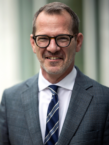 President Ian Baucom