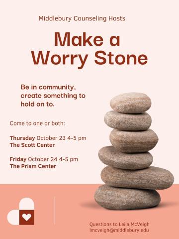 Small tower of 6 river stones with text.
