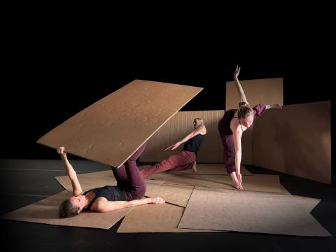 Dancers with cardboard
