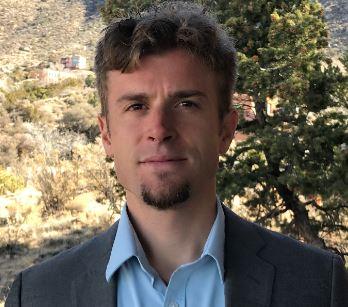 Man looking into camera.