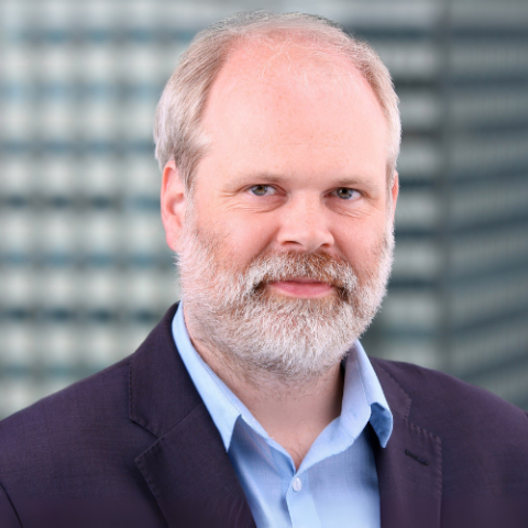 Man smiling at camera.