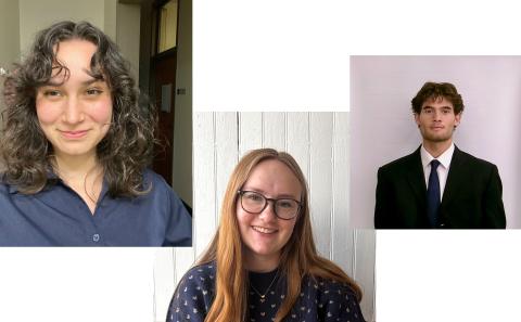 Two woman, one with dark wavy hair, blue shirt. One with long straight red hair and glasses. One man short dark hair, wearing a dark suit.