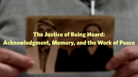 Two hands hold up an archival portrait of two people.