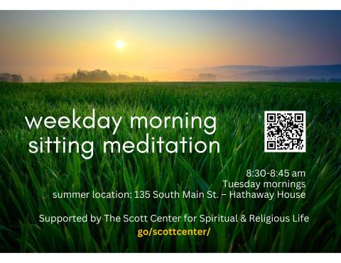 sunrise over a green grassy field