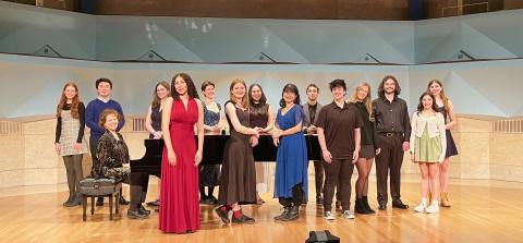 Artists standing on stage