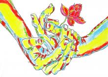 Colorful gratitude hands holding blooming flower