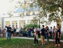 Image of a group of people outside of a building