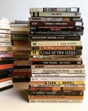 Image displaying three stacks of books.