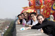 A photo of students on a balcony in Beijing.