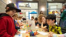 Children making art in the MAC Cafe