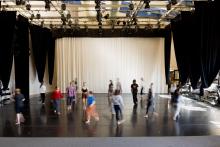Dancers moving through space