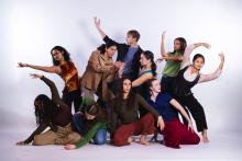 Dancers in a group against a white background