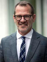 President Ian Baucom