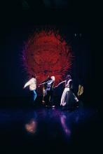 Dancers in front of projected images