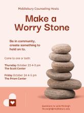 Small tower of 6 river stones with text.