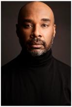 Close up of the artist, looking at the camera