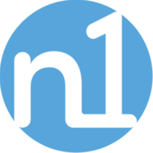 light blue circle with white script inside "n 1"