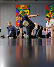 Dancers kneeling on the floor
