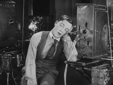 A projectionist sleeping on the job from Sherlock Jr. (1924)