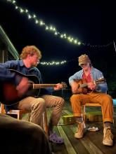 Two musicians playing guitar