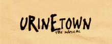 Urinetown show logo in yellow and black text