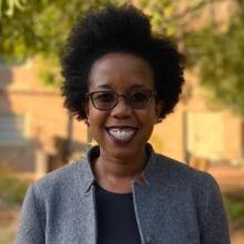 Woman smiling. Kelebogile Zvobgo.