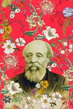 Martin Henry Freeman in the Foreground against a red background with flowers all around.