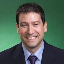 Man smiling at camera.