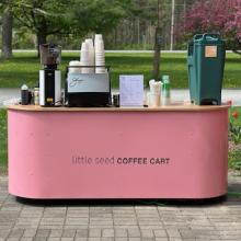 pink coffee cart with the text "little seed COFFEE CART"