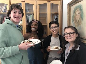 A group of students enjoying snacks
