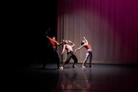three dancers on stage