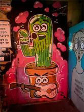 Image of a cactus painted on a wall