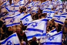 Image of people waving Israeli flags
