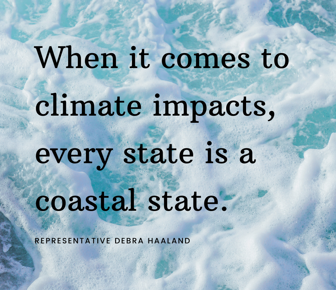 Blue water with white foam and black words "When it comes to climate impacts, every state is a coastal state." Deb Haaland