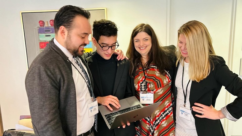 The team checked in at the Invent2Prevent competition. From left to right, David Santana, Kojin Glick and Amanda Morton are completing degrees in nonproliferation and terrorism and Kathleen Rabe is a student in the international policy and development program.