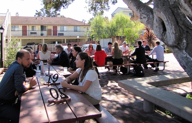 Life at MIIS Speed Students Talking with Alumni Outside at Holland Center