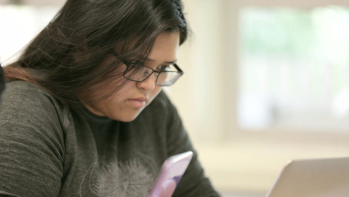 Student sitting at computer