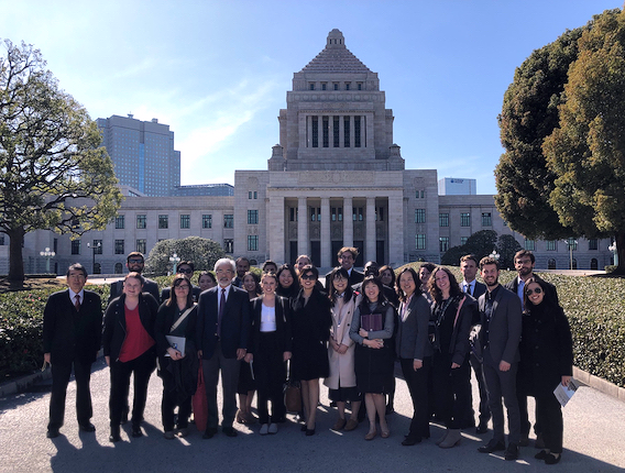 Group photo in front of a government building