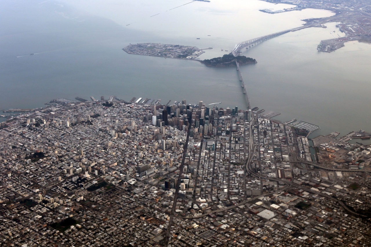 Aerial view of San Francisco and the Bay Bridge to Oakland, CA