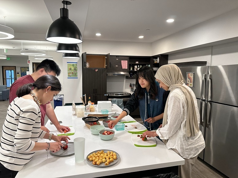 TESOL students making a meal