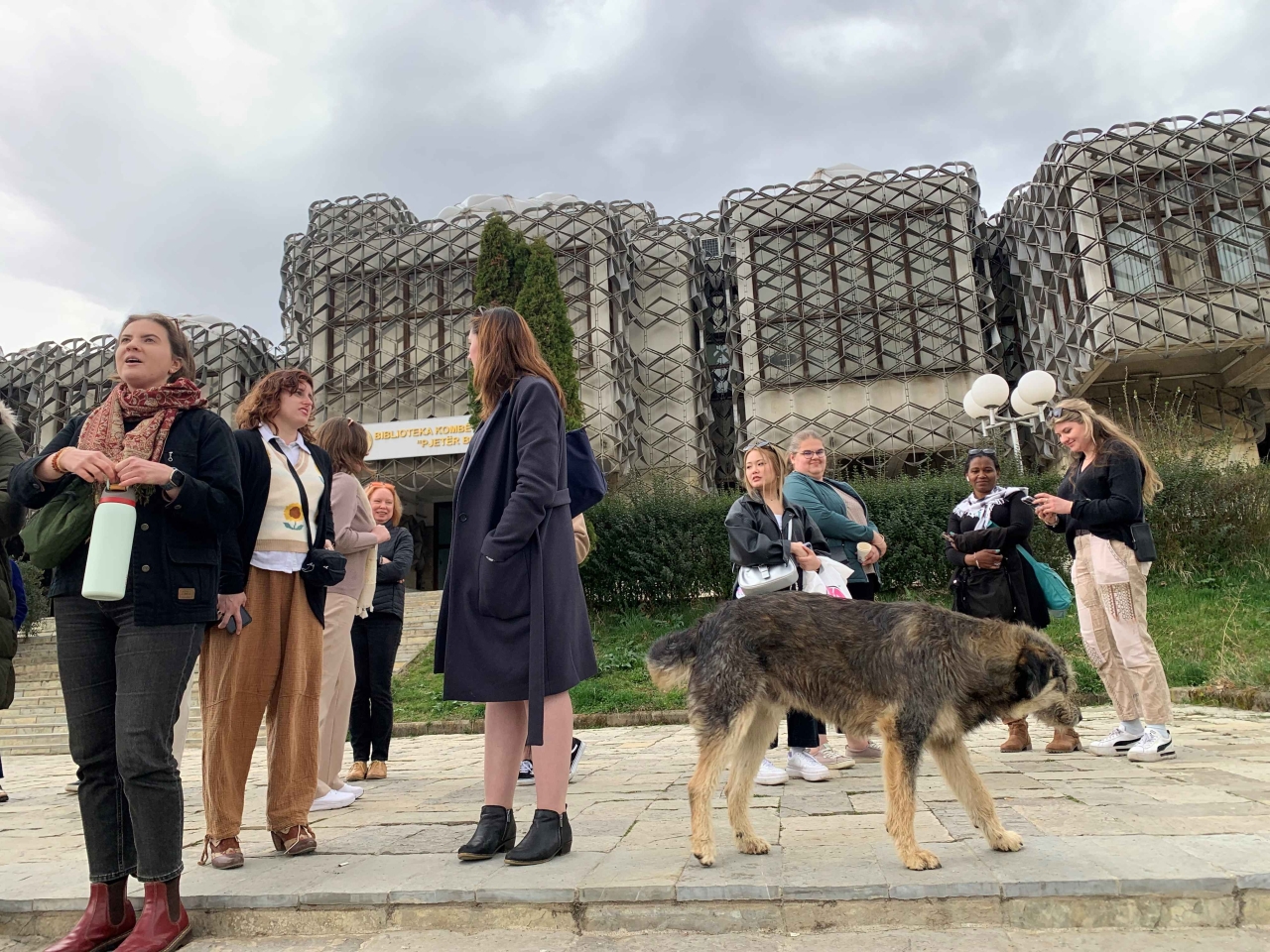 students and a dog in Kosovo