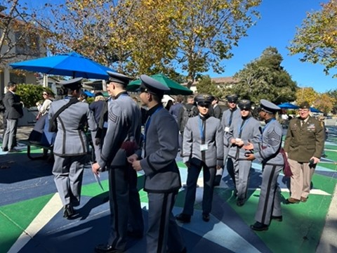 Several students mingling outside