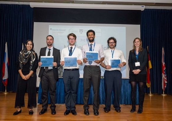A group of six people on stage