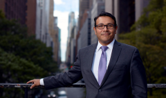 Jorge Silva on a city balcony