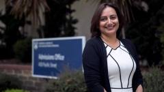 Sadia Khan standing outside in front of a Middlebury Monterey sign